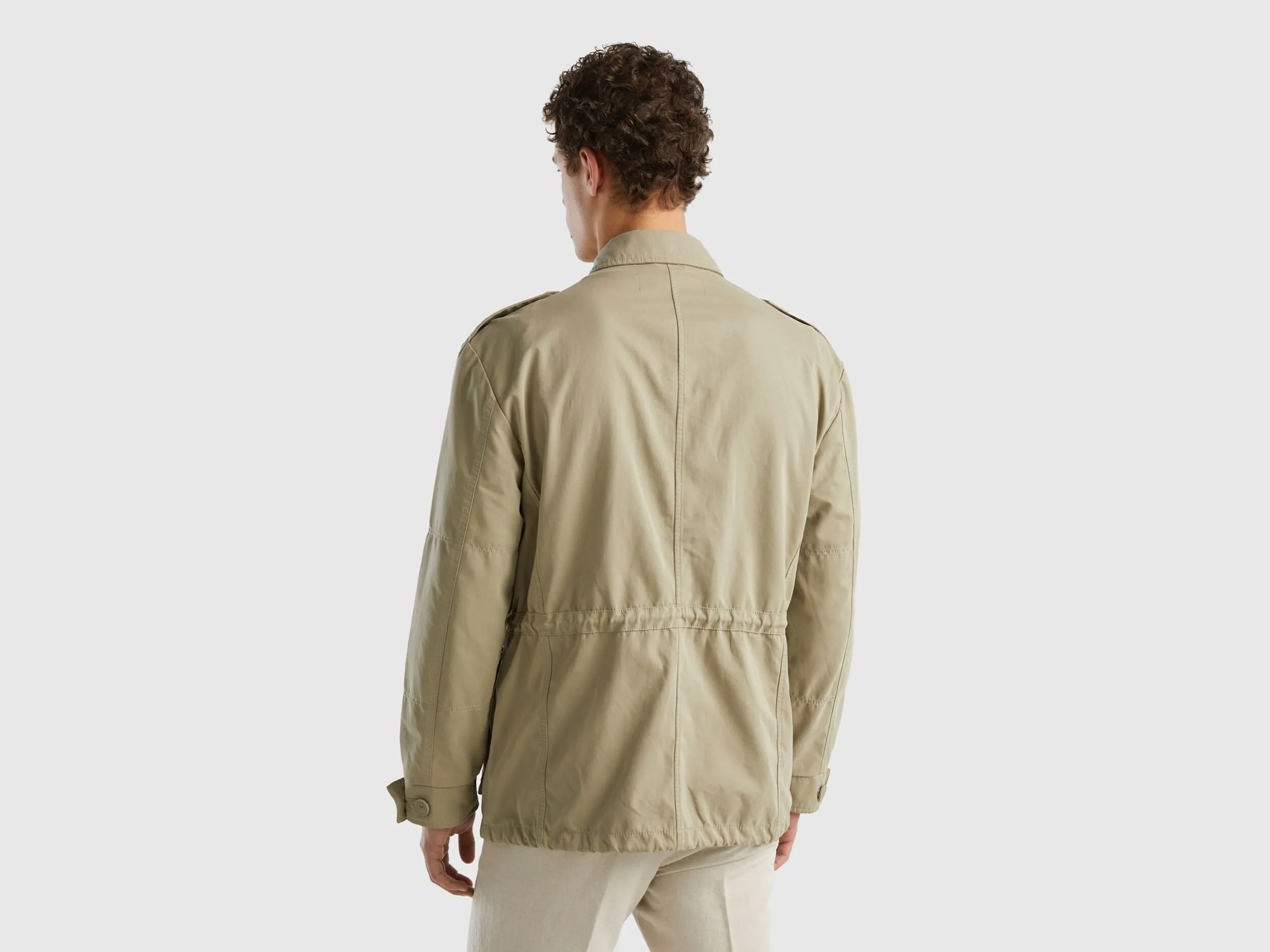 Jacket with pockets and drawstring - Light Green | Benetton